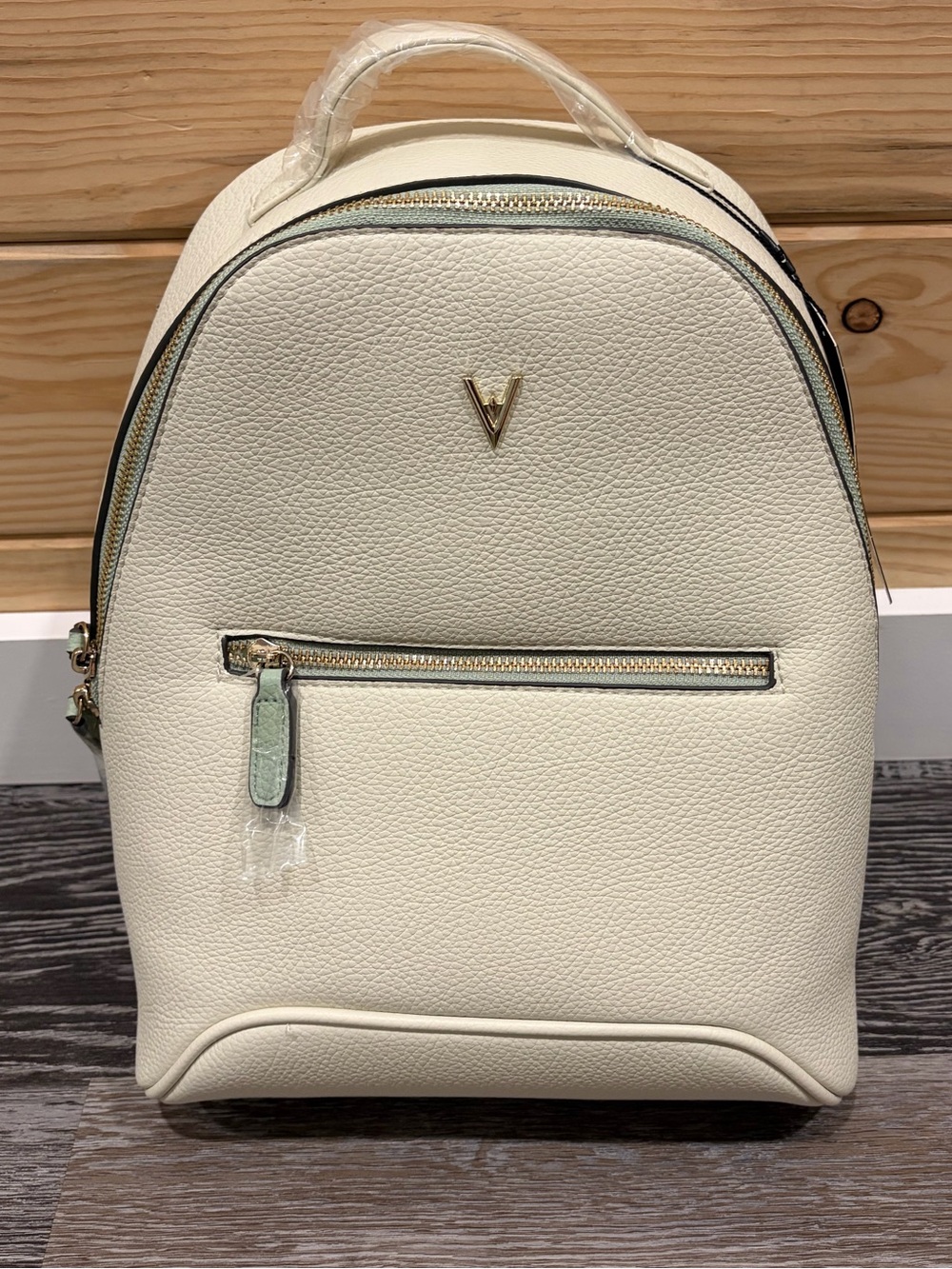Vanessa Williams Bone color backpack purse, mint interior.